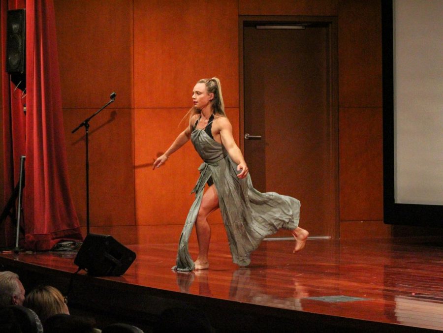 Hannah Levy, a clinical psychology graduate student, performs a contemporary style dance that highlights the impact of athletics on mental health on Friday night, at the CUB Auditorium.