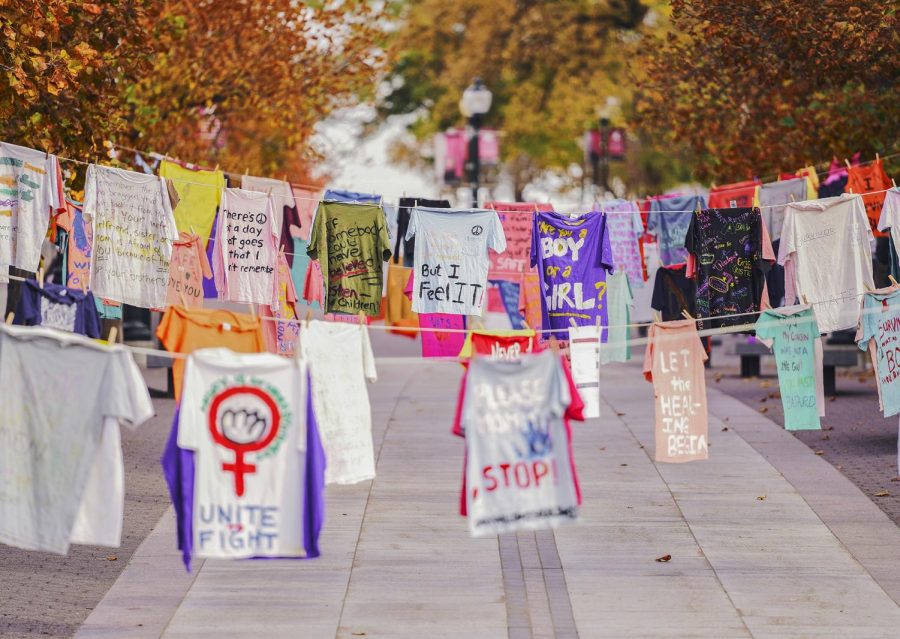 The Clothesline Project displays messages from survivors of domestic violence on t-shirts Tuesday afternoon on Terrell Mall. The display has been up since Monday. The project is organized by the WSU Young Women’s Christian Association.