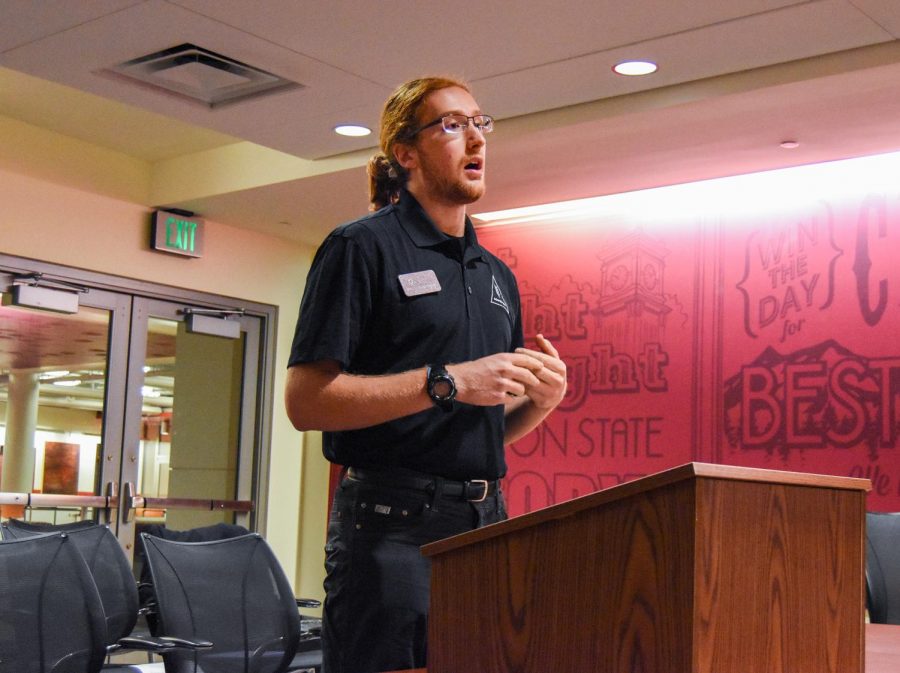 Patrick Robichaud, ASWSU environmental sustainability alliance committee chair, urges senators to take action and make a difference by taking down Snake River Dams at the ASWSU meeting on Tuesday evening, at the CUB.