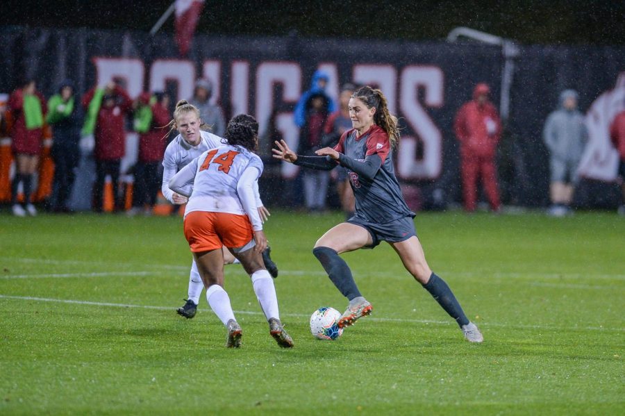 Graduate student midfielder Averie Collins challenges OSU’s defense on Sept. 28 at the Lower Soccer Field.
