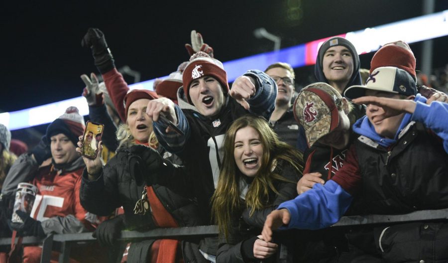 Fans+celebrate+after+WSU+scored+the+game-winning+touchdown+against+Oregon+State+Nov.+23%2C+2019%2C+at+Martin+Stadium.