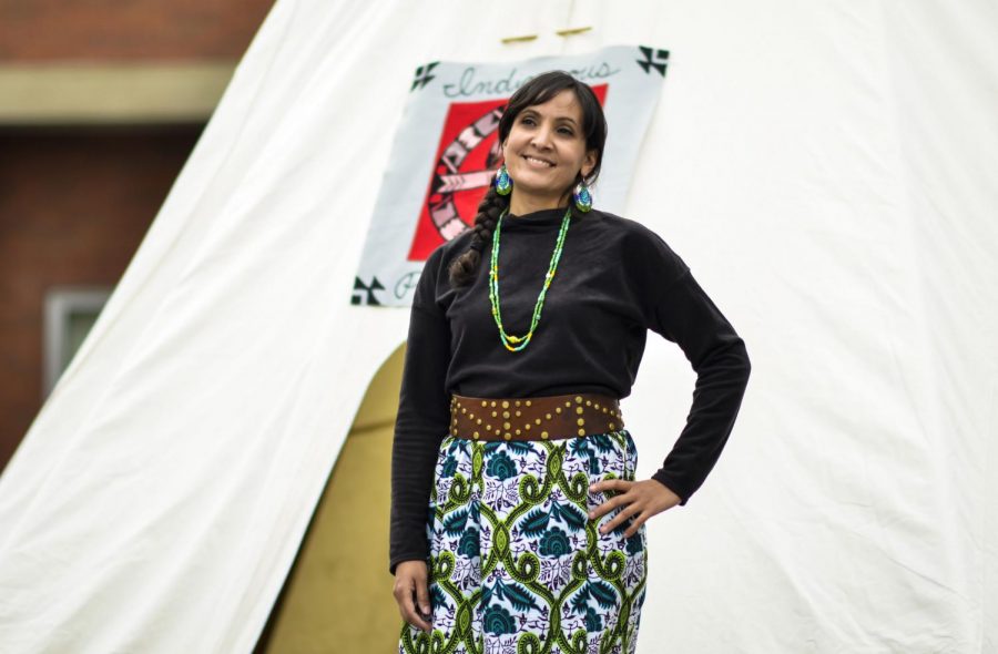 Then assistant director of Native Programs Faith Price poses for a picture in front of a tipi on Oct. 8, 2018, which was Indigenous Peoples Day on the Glenn Terrell Friendship Mall.