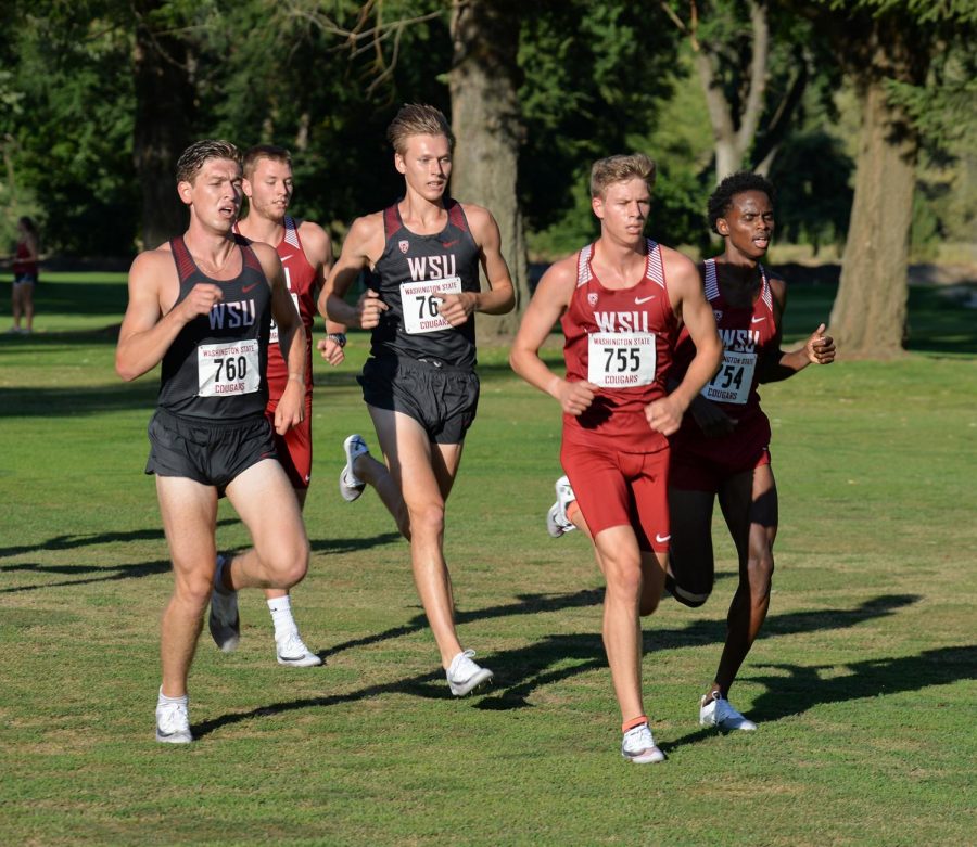 The+men%E2%80%99s+cross+country+team+competing+in+the+race+at+the+WSU+Open+on+Aug.+30+at+Colfax+Golf+Course.+