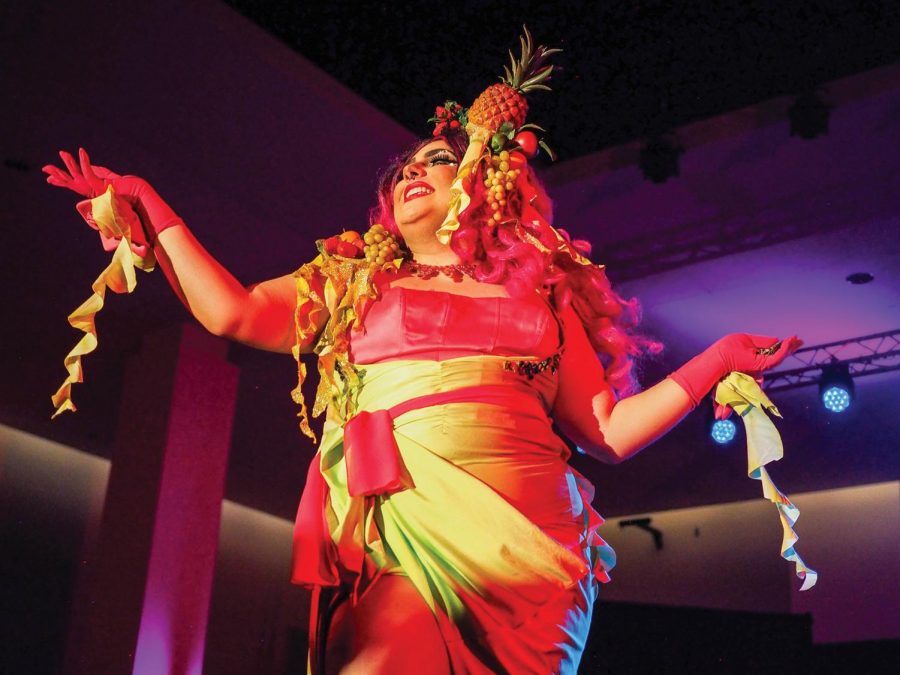 Hashtag Adjective, drag queen, dances and sings along to the song “Froot” by Marina and the Diamonds at the Unity Week Fashion & Drag Show on Tuesday at the CUB Senior Ballroom.