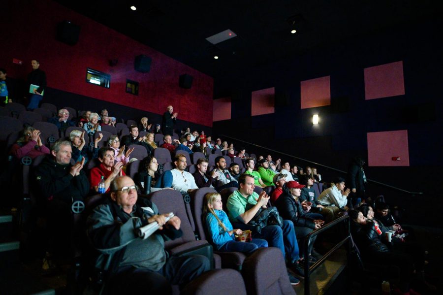 Despite the loss to North Carolina, Coug fans still cheer and celebrate for the Cougs amazing season on Friday evening at Pullman Village Center Cinema. 