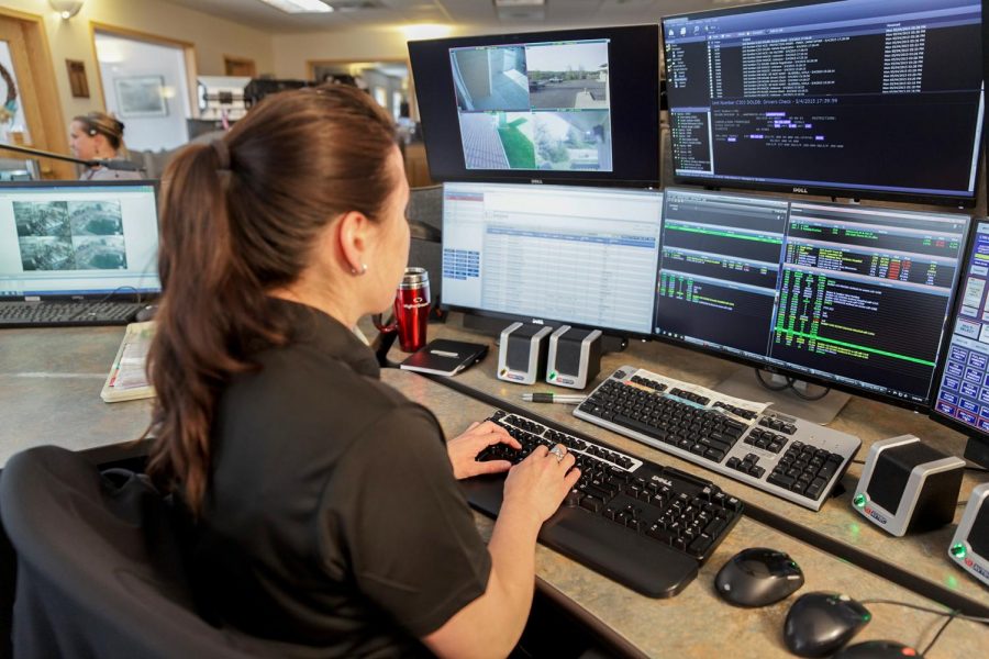 An employee for the Whitcom Regional Dispatch Center in Pullman works to answer 911 emergency calls and dispatches public safety first responders via radio.