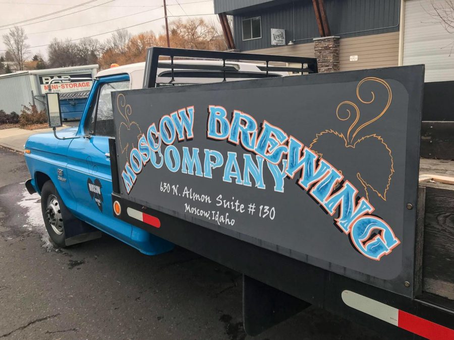A blue pickup truck with the Moscow Brewing Company name painted on the side sits parked in front of the business on Dec. 1. Aaron Hart, owner and head brewer, said they use the truck to deliver kegs to local businesses.