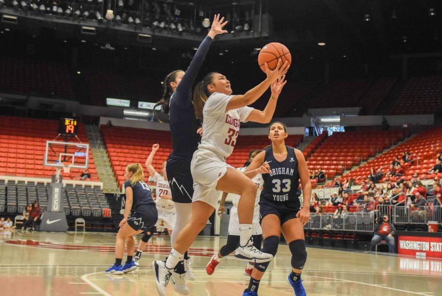 Sophomore guard Cherilyn Molina goes up for the shot against Brigham Young on Nov. 9 at Beasley Coliseum.