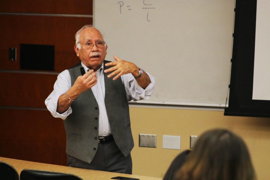 Emeritus professor at the University of Washington Carlos Gill explains the importance that recording and documenting his family had to him, Thursday evening in the CUE building.