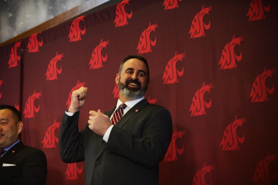 Still learning the Washington State Fight song, the new football head coach Nick Rolovich laughs off his mistake before his introductory press conference Thursday afternoon in the Rankich Club Room at Martin Stadium. 