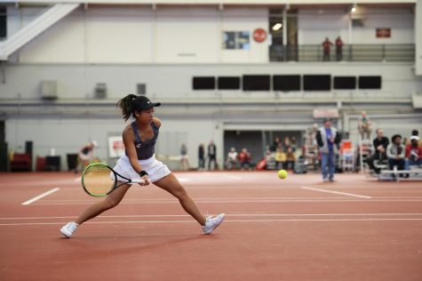 Then-Freshman Savanna Ly-Nguyen prepares to return a ball during her singles match Jan. 12, 2019 against Idahos Anna Stefani. Ly-Nguyen won the match in two sets winning 6-4 and 6-0 respectively. 