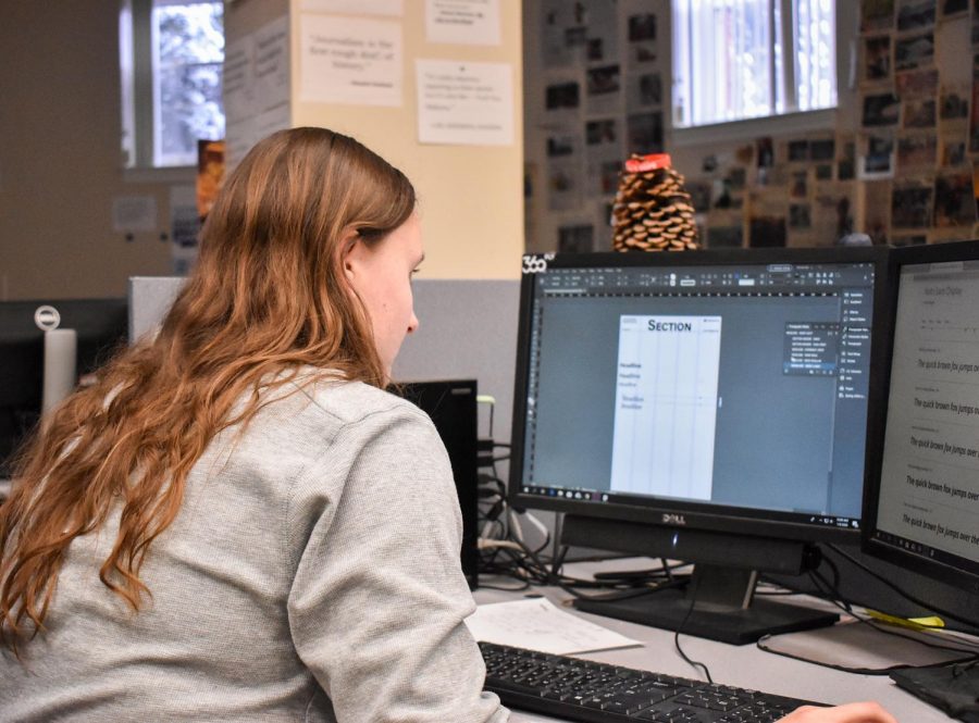 Chief Layout Editor Jacqui Thomasson uses Adobe InDesign to reformat the newspaper templates section editors use to lay out their pages. 
