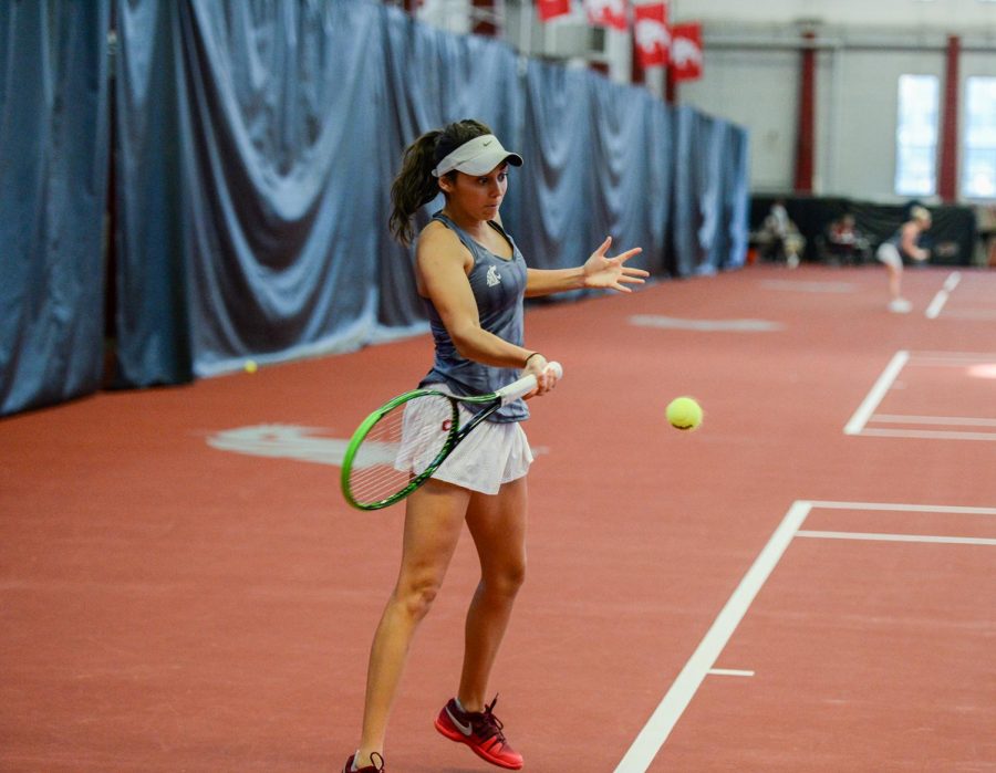Then-junior+Melisa+Ates+returns+a+ball+during+doubles+play+against+Idaho+on+Jan.+12+at+Hollinhbery+Field+house.