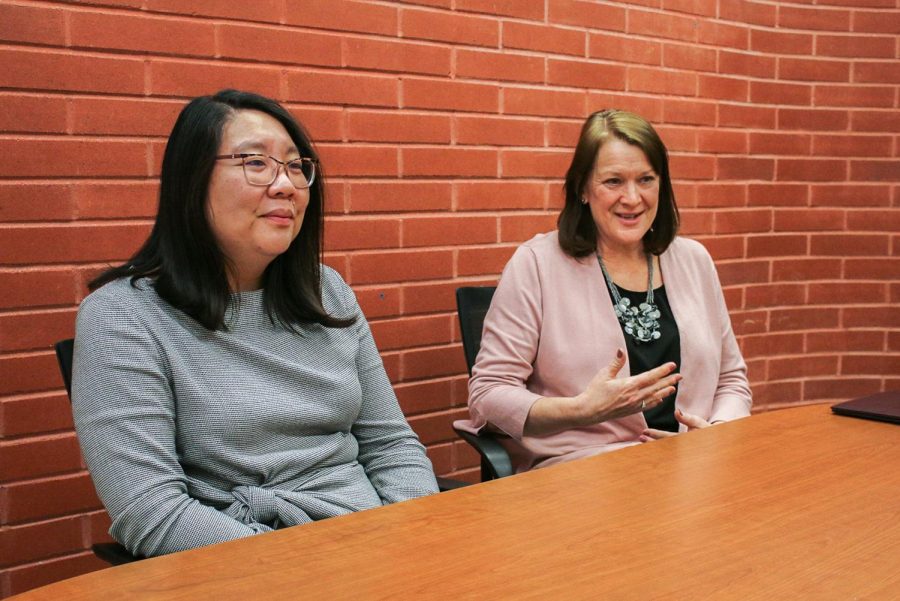 Associate Dean of Students/Student Care Director Karen Fischer, right, explains how the Student Care Network provides outreach for students during an interview Tuesday afternoon in the Lighty Administration building.