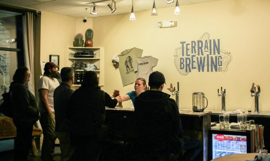 Customers enjoying drinks at the new microbrewery, Terrain Brewery on Jan. 25 in Pullman.