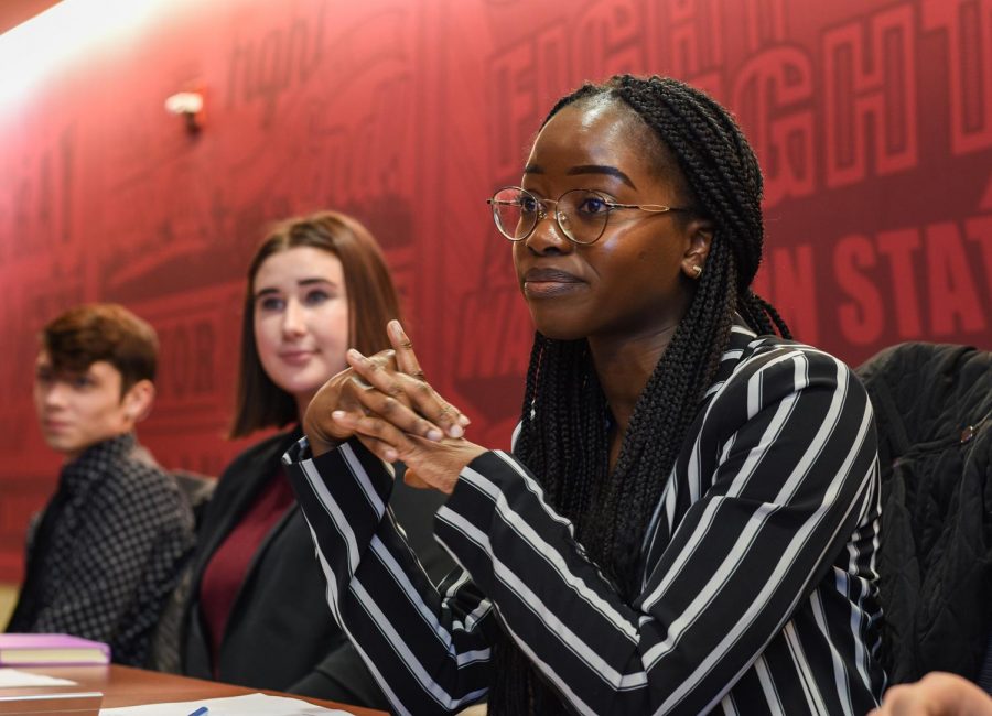 Oluwanifemi Shola-Dare, ASWSU Senator, expresses her concerns for first generation students who are unable to pay for tuition on Wednesday evening at the CUB.