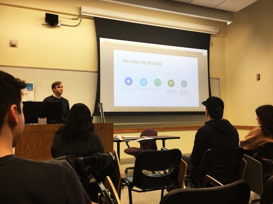 Gavin Green, Census Bureau recruiting assistant, gives a presentation on the 2020 Census and explains what the job entails on Wednesday at Todd Hall, Room 302.