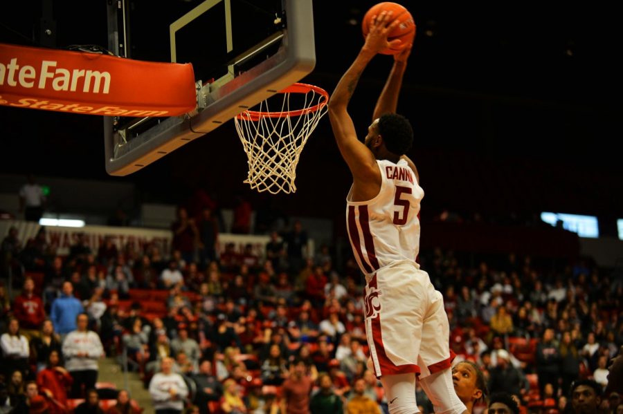 Then-sophomore forward Marvin Cannon dunks the ball against UW on Feb. 16, 2019 at Beasley Coliseum.