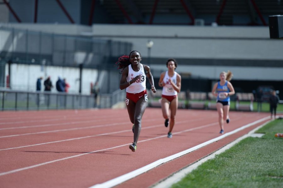 Then-junior distance runner Janet Okeago pulls ahead in the womens 5,000-meter run on April 27 at Mooberry Track.