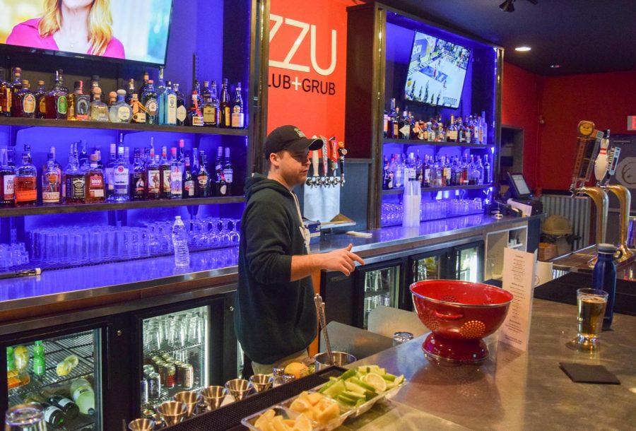 Former ZZU Manager Skyler Cracraft tends to the bar at the ZZU Club and Grub bar in February 2018.