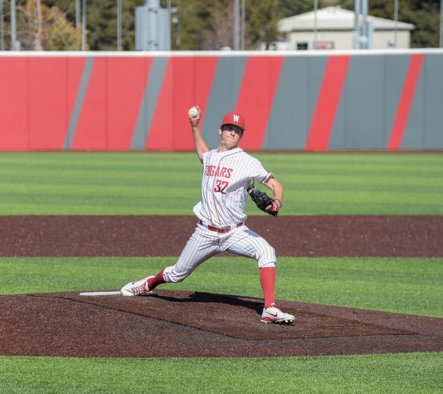 Then-freshman right-handed pitcher Connor Barison pitches against Stanford on March 31 at Bailey-Brayton Field.