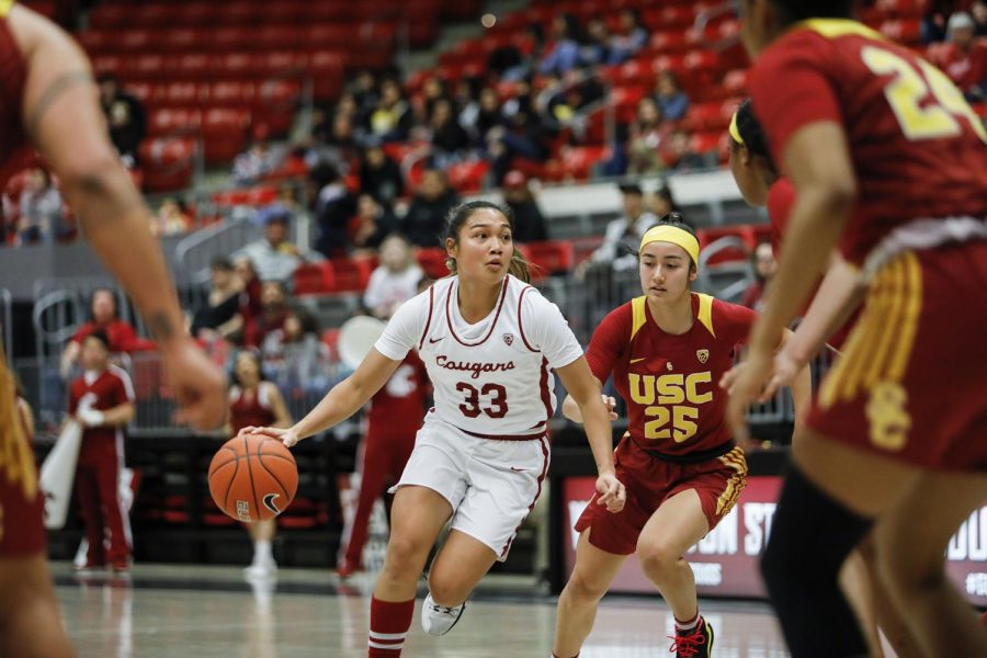 Sophomore+guard+Cherilyn+Molina+dribbles+up+the+court+against+USC+on+Jan.+24+at+Beasley+Coliseum.
