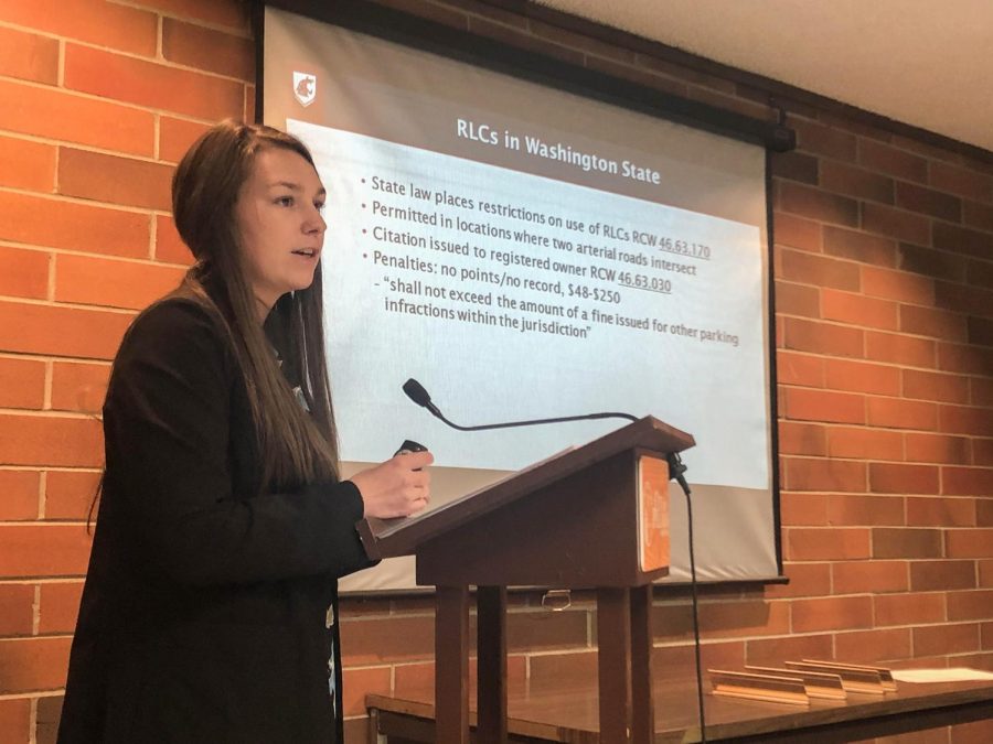 Megan Parks, WSU criminal justice and criminology doctoral student, presents research about the effectiveness of red-light cameras on Monday during a Pullman Police Advisory Committee in the City Hall Council Chambers. 