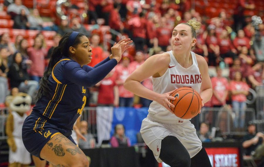 Freshman center Emma Nankervis looks to penetrate the California Golden Bears defense on Jan. 31 at Beasley Coliseum. Cougars secure another win.
 
