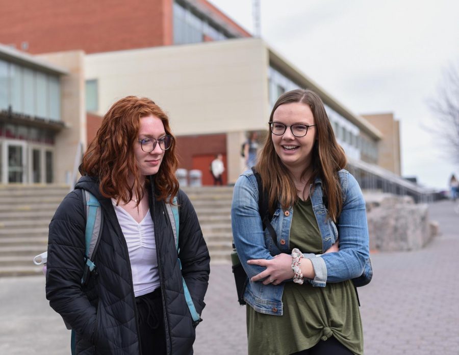 Anna Wilson and Sarah Weatherford, both sophomores at WSU, talk about their plans to go to the West Side on a Friday afternoon on the Terrell Mall.