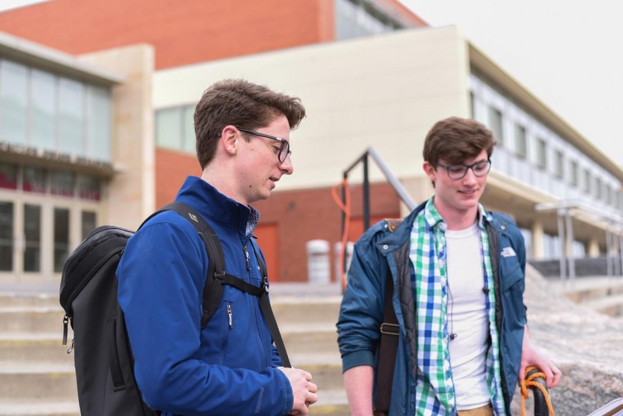 Reese Rhyas and Simon Rosenzweig, both sophomores at WSU, talk about their plans to travel to Banff on a Friday afternoon on the Terrell Mall.