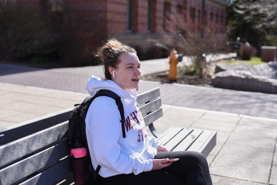 Aubrey Sullivan, a freshman accounting major, talks about her plans to travel to Phoenix on a Monday afternoon on the Terrell Mall.