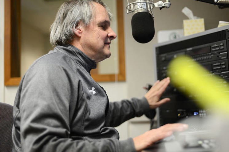 Dan Maher records a 30-second promo for his NWPR program Inland Folk in the studio, Feb. 20, 2014.