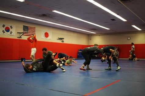 WSU club wrestlers practice on Feb. 24 in the Physical Education Building. The team’s coach won Northwest Conference Men’s Coach of the Year.