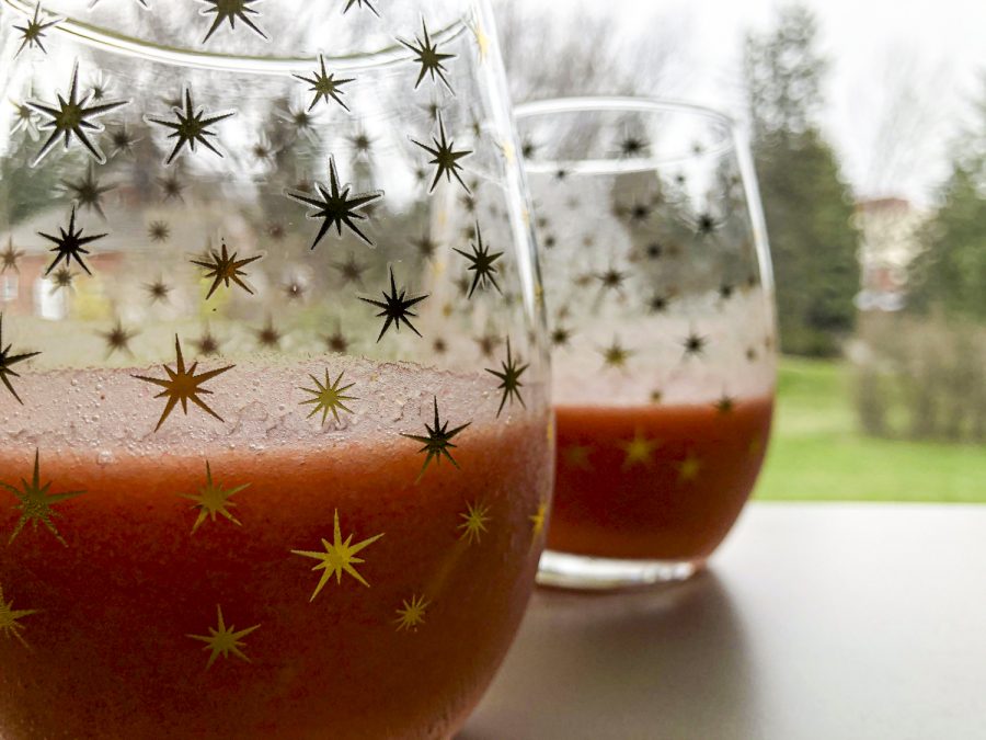 Freshly made mango-pineapple-strawberry smoothies. Each recipe makes roughly 16 ounces of smoothie - enough to split with a friend.