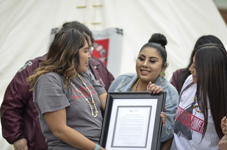From left to right: Kyra Antone, MyKel Johnson and Jaissa Grunlose hold the proclamation to make Indigenous Peoples’ Day official at WSU in 2018. The decision came after extensive efforts made by Indigenous students, and the idea of an Indigineous Peoples’ Day has been around since the ‘70s.