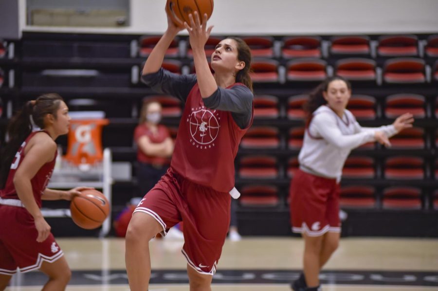 Junior forward Shir Levy goes up for a shot during practice in preparation for the expected December season. 