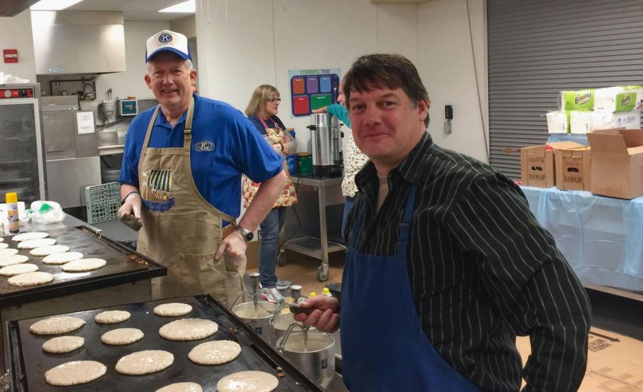 Glenn Johnson and David Harder make pancakes for the 2016 Kiwanis event.