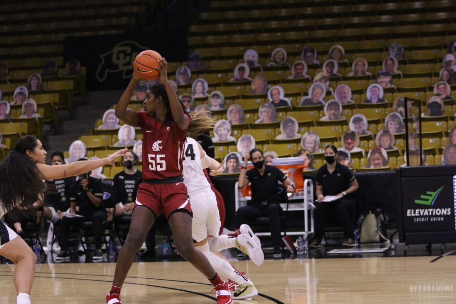 Sophomore center Bella Murekatete holds the ball at the top of the key against Colorado on Jan. 3, 2021.