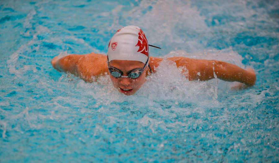 Senior and team captain Mackenzie Duarte competes in the breaststroke event.