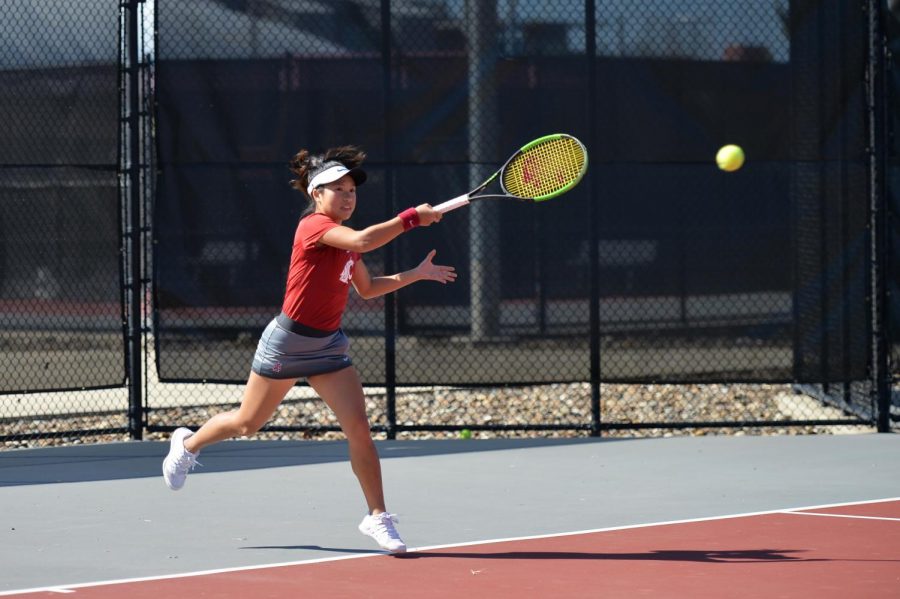 Then-freshman Savanna Ly-Nguyen hits the tennis ball back toward her opponent on Mar. 31, 2019 at the Outdoor Tennis Courts.