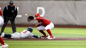 Then-sophomore Kyle Manzardo attempts to tag Gonzaga runner.