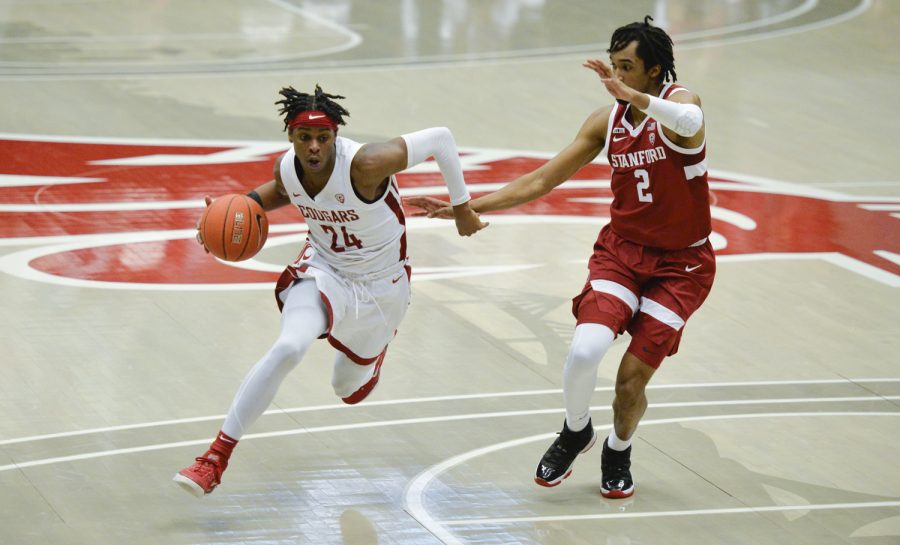 Sophomore guard Noah Williams drives to the hoop against Stanford junior guard Bryce Wills during the matchup Feb. 20 in Beasley Coliseum.