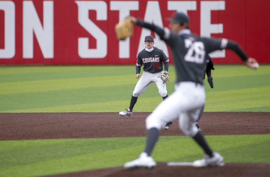Junior infielder Kodie Kolden moves as junior pitcher Brandon White throws a pitch during the game against Seattle U on March 6 at Bailey-Brayton Field.