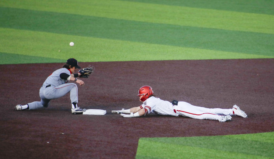 Senior infielder Jack Smith slides into second as the ball misses the second baseman during the game against Seattle U on March 5 at Bailey-Brayton Field.