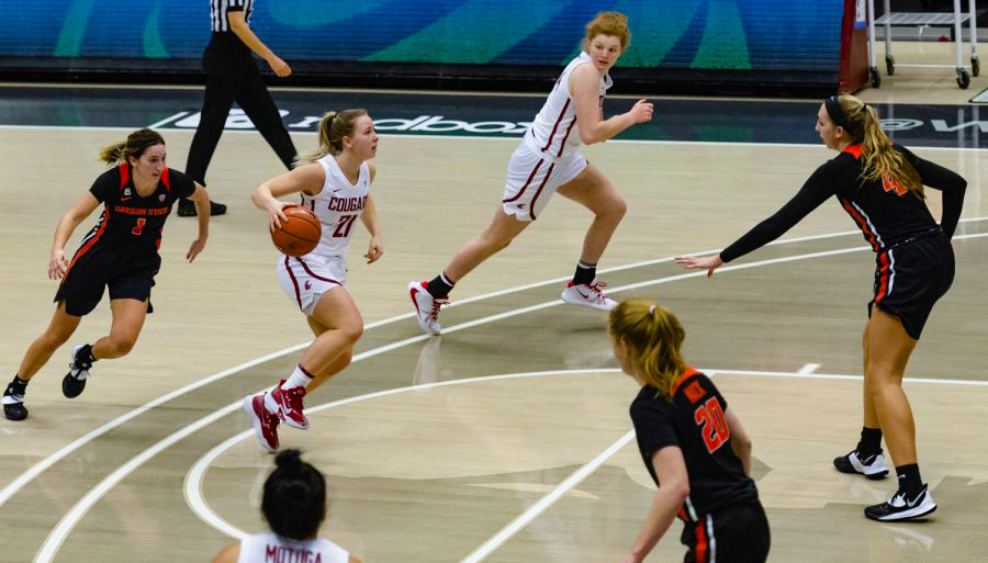 Sophomore guard Johanna Teder drives towards hoop as she looks for open teammates.