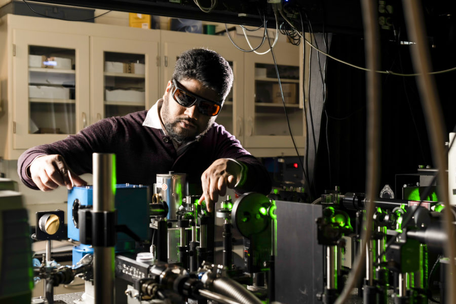 Alumnus Ranga Dias uses equipment that compresses and alters the properties of hydrogen-rich materials in his lab.