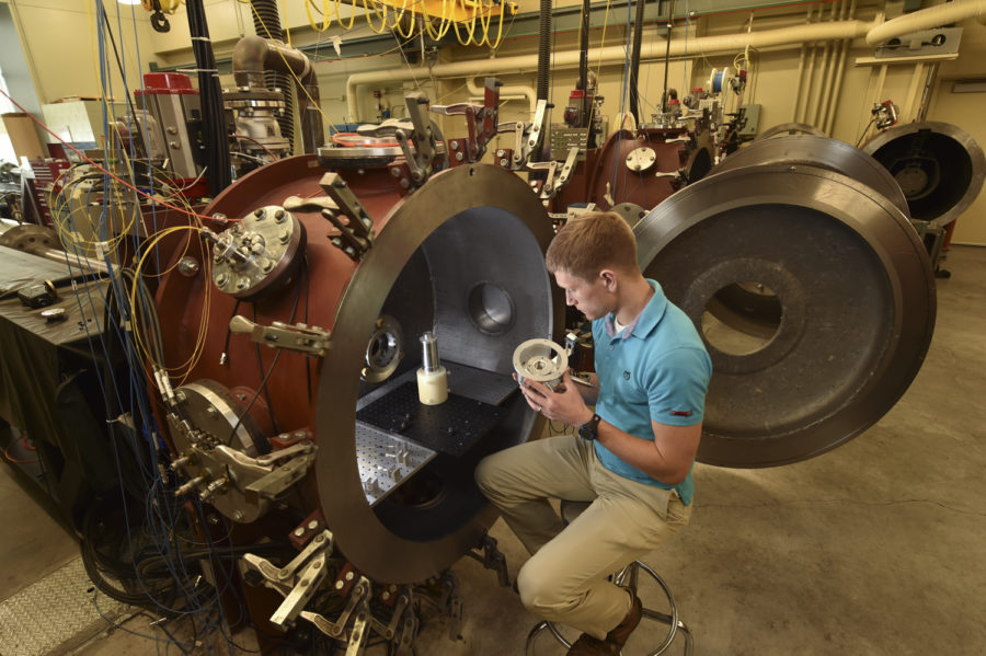 Travis Volz, who researched this during his doctoral work at WSU, experiments with diamonds in the Institute for Shock Physics’ Impact Laboratory.