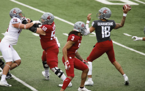 Recent transfer quarterback Jarrett Guarantano takes and throws his only snap before injury in the Crimson and Gray game last Saturday at Martin Stadium.