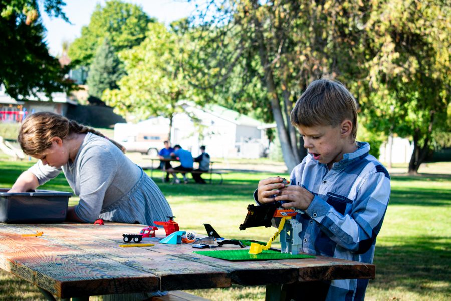 Families start constructing their haunted houses at the Lego building challenge in Garfield, Washington. 