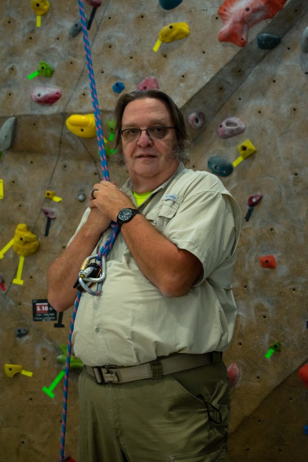 Jeff Riechmann, the founder of Courageous Kids Climbing, poses at the climbing wall, Sunday, Sept. 27, 2021, in Pullman, WA.